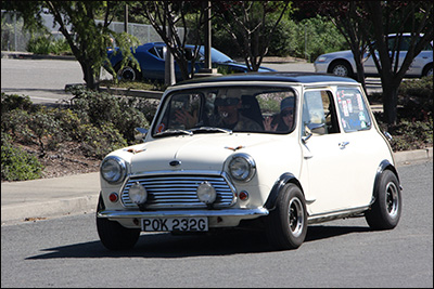 white mini leaving 1st checkpoint